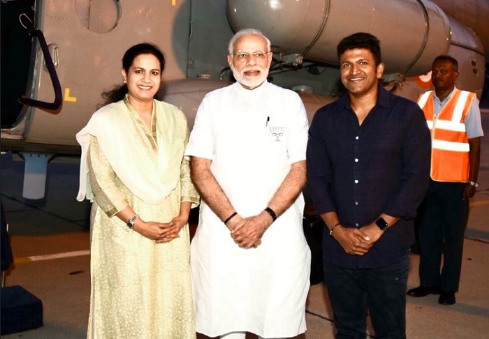 Kannada Actor Puneeth Rajkumar Meets Prime Minister Modi Rajkumar and smt parvatamma rajkumar. kannada actor puneeth rajkumar meets